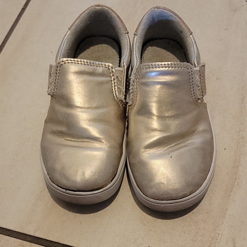 gold tennis shoes